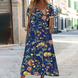 Isaura | Bohemian Dress with Floral Design and Belly Coverage