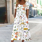 Isaura | Bohemian Dress with Floral Design and Belly Coverage