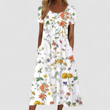 Isaura | Bohemian Dress with Floral Design and Belly Coverage