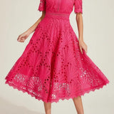 Irina – Midi suknelė su nėriniais ir išpjovimais" can be rewritten as "Irina – Midi Dress with Lace and Cut-Outs.
