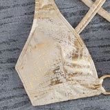 Antoanela – Bikini su metaliniu užsegimu" could be rewritten as "Antoanela – Bikini su metaliniu užsegimu