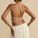 Florina – Viršus su plisuota nugarėle" could be rewritten as "Florina – Top with Pleated Back Detail.